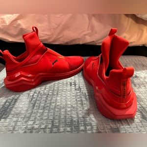 Red puma sneakers